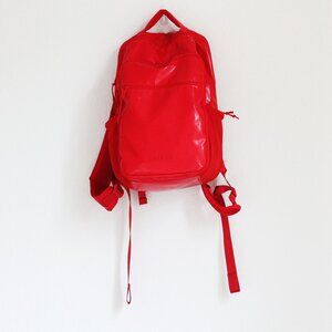 Red Calpak Laptop Backpack